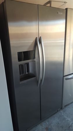 Refrigerator brand Kicheaid measures 36 wide and 70 high 2 months warranty delivery and installation