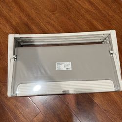 Brand new four-tier shoe rack, holds 12 pairs of shoes.