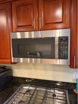 GE Profile™ 1.7 Cu. Ft. Convection Over-the-Range Microwave Oven