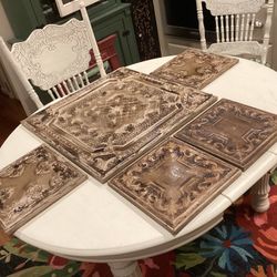 5 Tin wall hangers ( art) brown / tan in wood frames very easy to hang all 4 small ones 1 large one  Measurements  Large one - 24.5- 24.5 Small  ones 