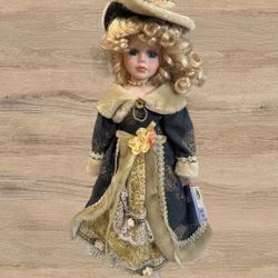 FANTASY DOLL COLLECTION.PORCELAIN DOLL w/BLOND HAIR and BEAUTIFUL VINTAGE DRESS & HAT. 16 “
