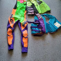 2 adult size, large life vests, with adult jet pilot wetsuit Sz L. all for $30 firm.