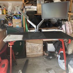 Gaming Table With Dual Adjustable, Monitor Arms, And One Monitor