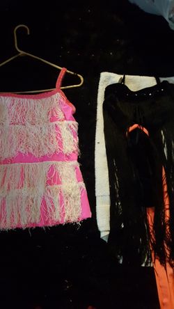 10 FOR BOTH ART STONE DANCE CUSTOMS OR HALLOWEEN COSTUME BOTH ARE ADULT SMALL AND HAVE FRINGE ON FRONT AND BACK