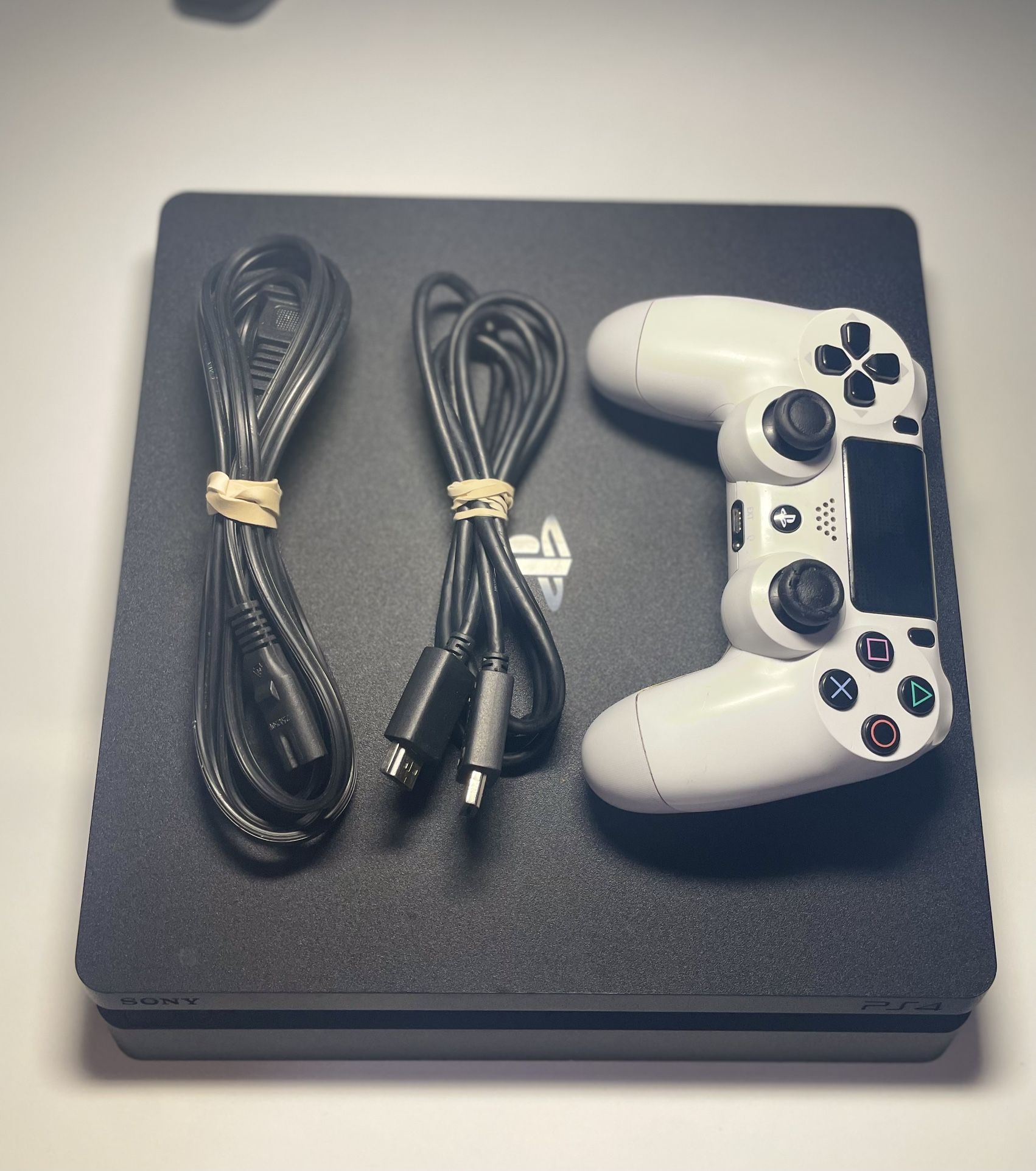 PlayStation 4, PS4 with 500GB of storage And Controller.