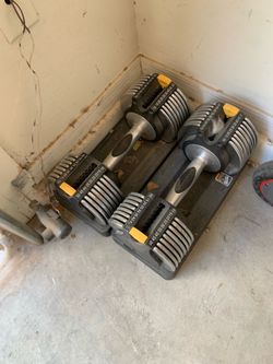 Adjustable dumb bells