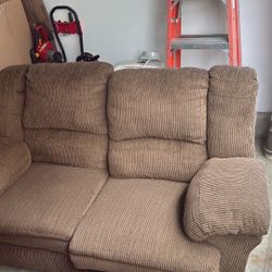 Brown recliner loveseat