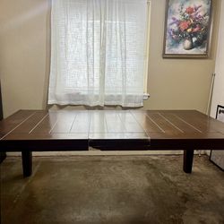 Brown wooden table with six chairs