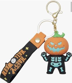 New in box Happy Halloween glow in the dark skeleton pumpkin head keychain