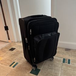 Delsey Overhead Expandable Roller Suitcase