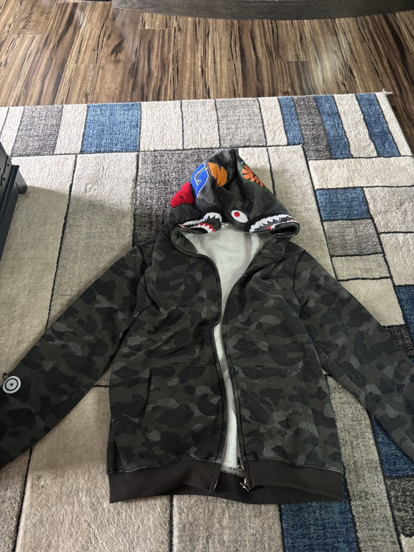 Used Bape hoodie very good quality. I am asking 60 for size medium.