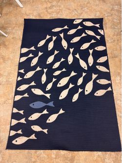 Outdoor fish themed carpet 5’ x 7’