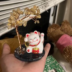Maneki-neko (lucky cat) with a crystal tree