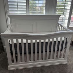Used crib with some flaws , Brand new mattress double sided . No stains .