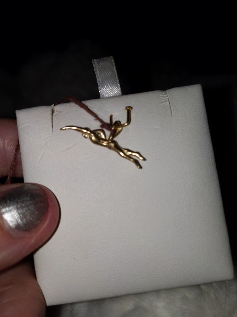 SOLID GOLD SWIMMER CHARM. PENDANT OR CHARM YELLOW GOLD CHARM