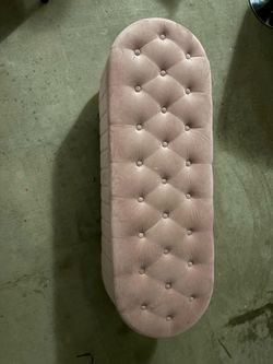 Pink end of bed ottoman with storage