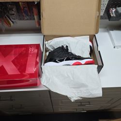 Air Jordan 11s Bred