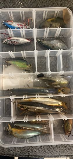 Assorted fishing lures with tacklebox