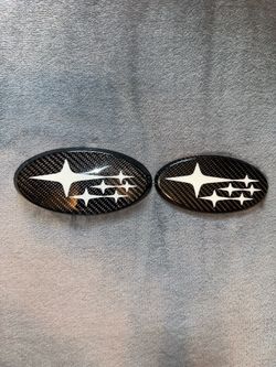 Carbon Fiber Subaru emblems (Front & Rear)