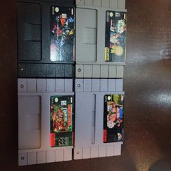 4 Super Nintendo Game Cartridges