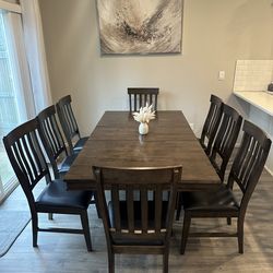 Super solid hardwood dining table 8 big chairs . Bought it for $2500. It’s super heavy table .  I have attached all the pictures of wear and tear on t
