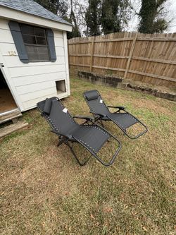 Two Reclining Lounge Chairs