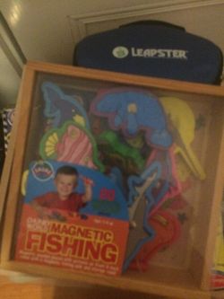 Magnetic wooden fishing game