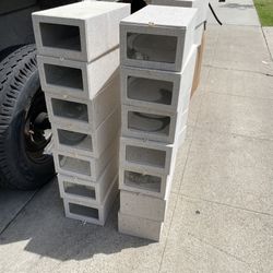 linen-textured storage boxes feature a clear front panel for viewing shoes or other household items.