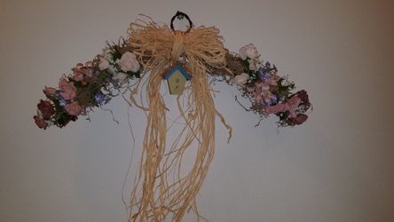 Handcrafted arched floral wreath