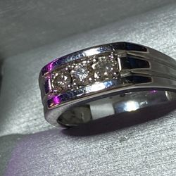 Man diamonds rhodium over 10 K gold ring