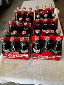 Collectible Coca Cola hot august night bottles