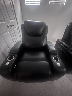 2 Black Reclining Chairs