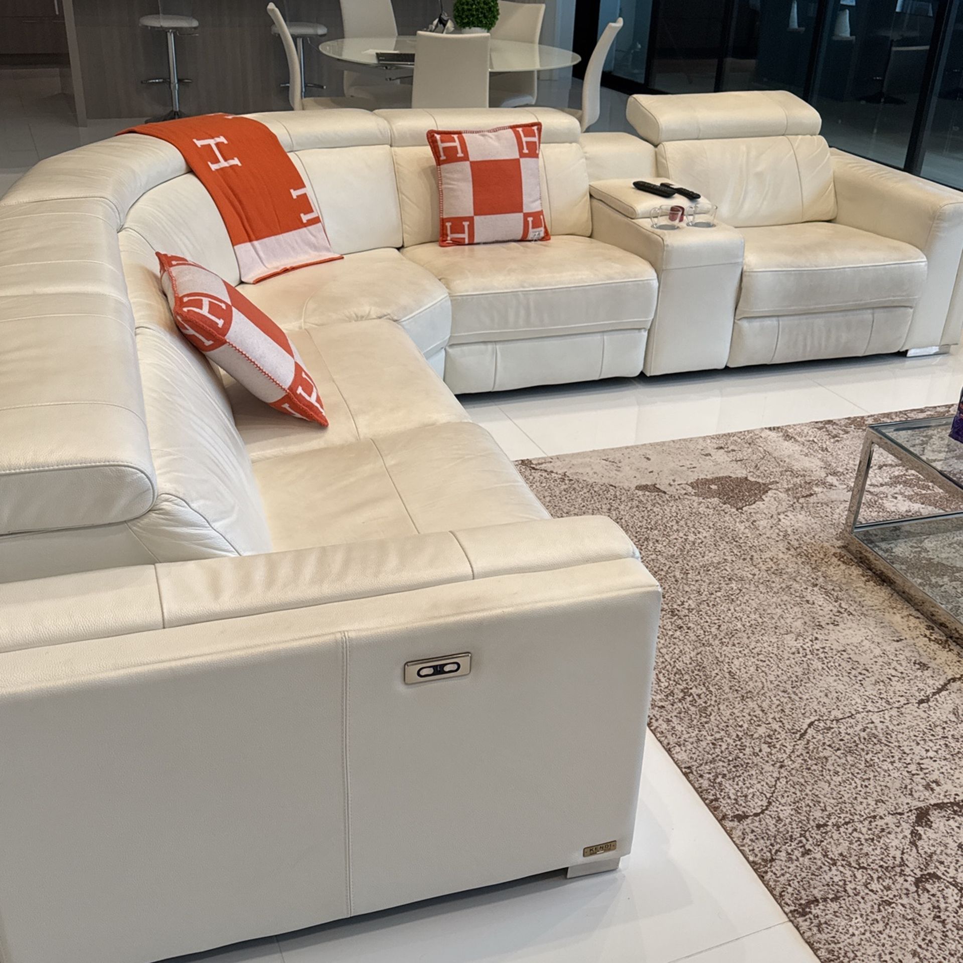 White Italian leather Sectional With Two Additional Matching Sections And Ottoman