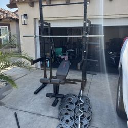 Rogue s-2 squat rack/ Bench press with 7ft 45lbs bar plus 255lbs of Olympic weights and curl bar