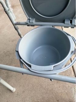 Drive Medical Folding Steel Bedside Commode easily opens and