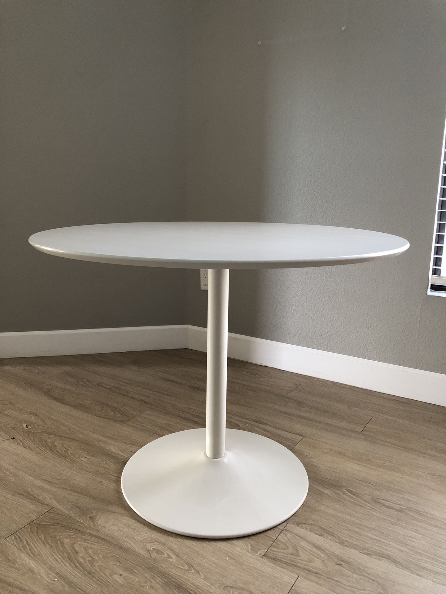 CB2 Dining table, White, 39”W x 30.25”H
