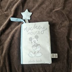 This is a Disney Baby Soft Mickey Mouse "My First Photo Album" Crinkle Play Book.