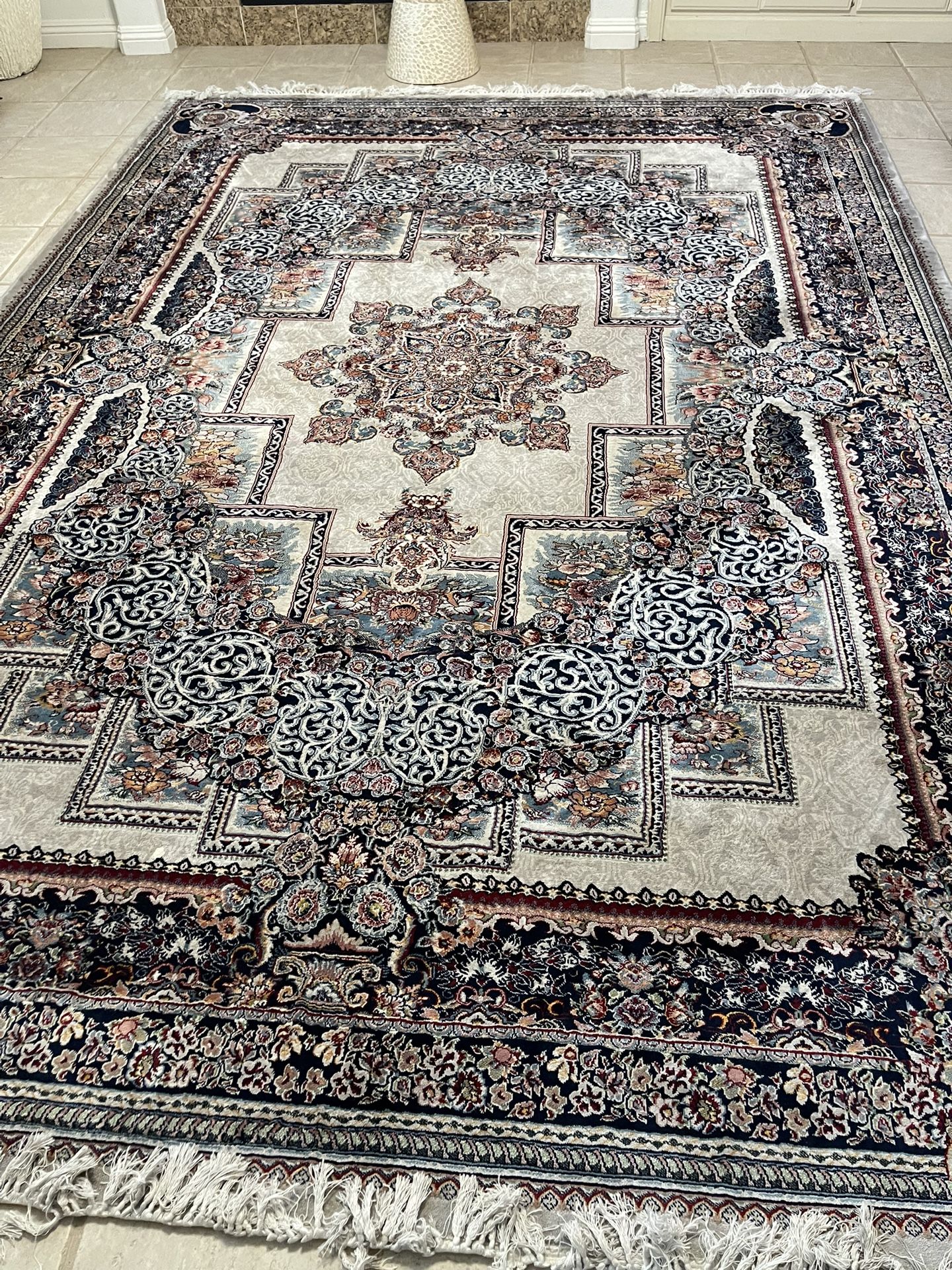Pair Of Rectangular And One Matching Round Area Rugs