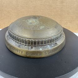 Banthrico Metal Bank Harris County Domed Stadium First State Bank of Bellaire Astrodome 1960’s  No Key It looks like it’s brass but I’m not positive. 