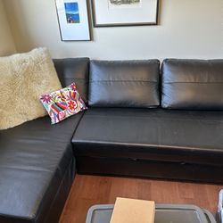 Black faux leather Sleeper Sofa 