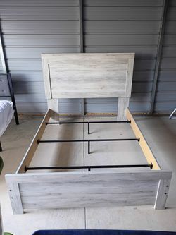 Ashley Furniture Queen Size Bed Frame  ( Free Delivery If Needed)