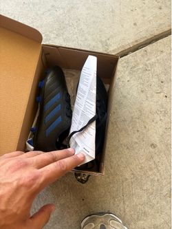 Soccer cleats still in box