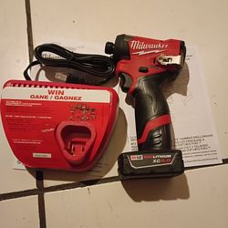 Milwaukee M12 Fuel Impact Drill & Battery Xc4.0 And Charger .Brand New.
