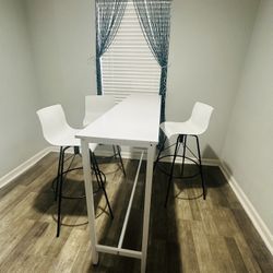 High table with three chairs.     Free Delivery!!!