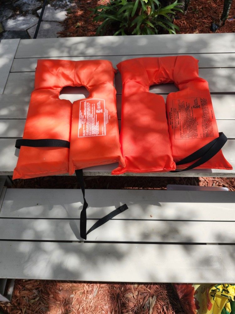To adult life jackets brand new! $10 For both