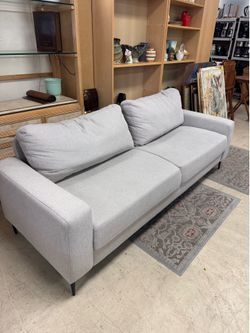 modern light gray sofa with plush, low-profile cushions and rounded arms - 81”