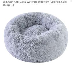 Cat bed or small dog bed. 