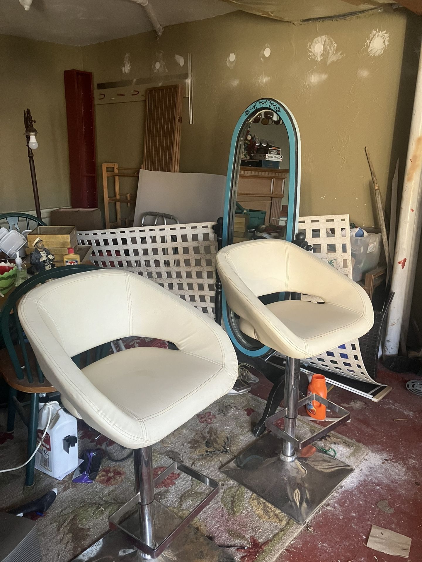 Two White Leather Barstools, They swivel and go Up And Down