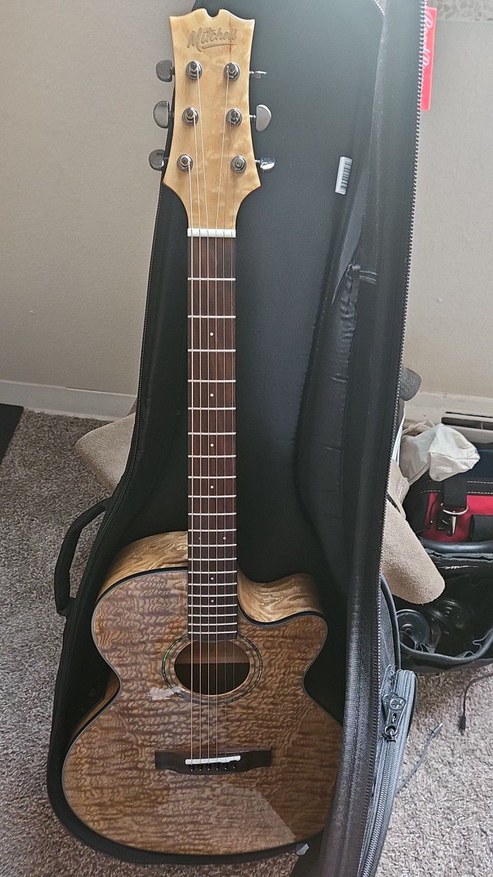 Mitchell acoustic electric guitar 