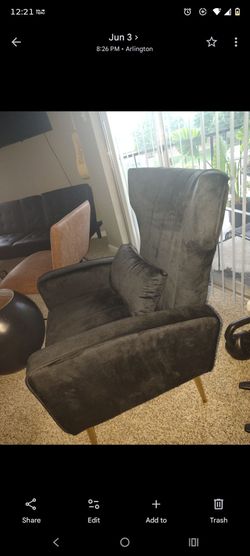 Black velvet like wingback chair